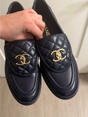 CHANEL Navy Quilted Leather Slip-On Loafers with Gold CC Hardware